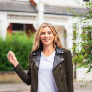 Woman providing a testimonial for Modern Decks and Vinyl Fences.