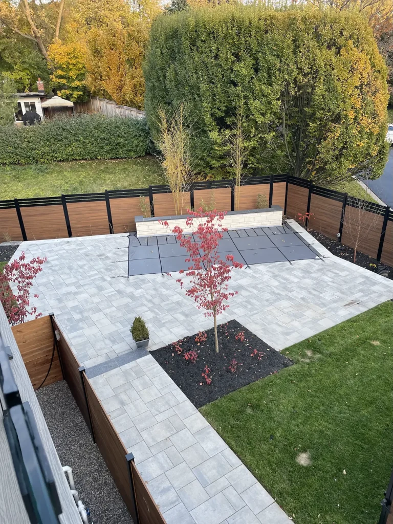 Aerial drone view of a premium vinyl privacy fence installation in Burlington.