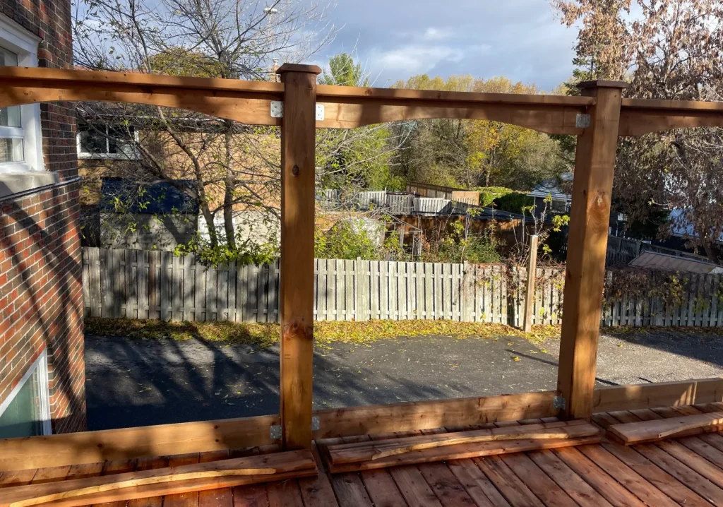 Detailed view of the structural framing and heavy-duty underneath support for a custom wood deck in Oshawa.