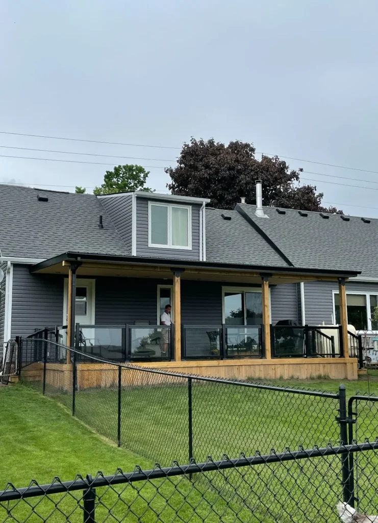 Durable pressure-treated platform deck build from the ground up by a Bowmanville deck builder.